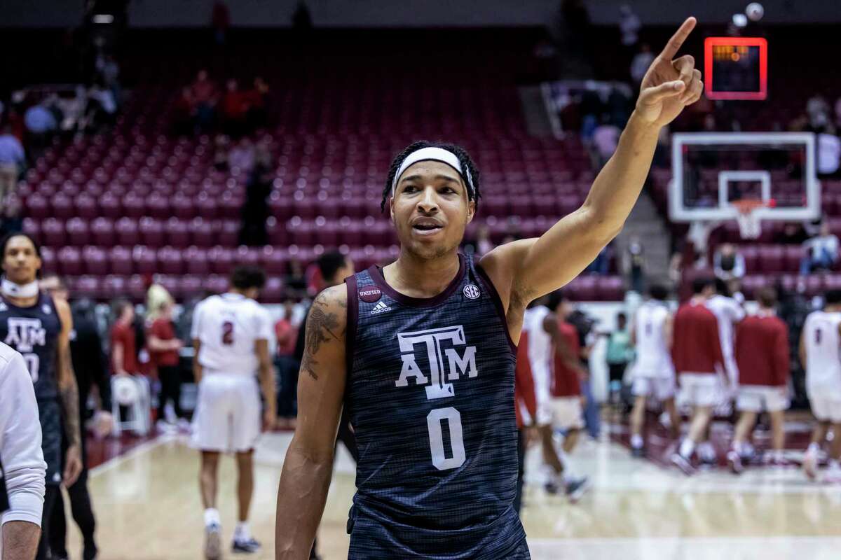 Texas A&M guard Aaron Cash celebrates the team's win over Alabama in an NCAA college basketball game, Wednesday, March 2, 2022, in Tuscaloosa, Ala. (AP Photo/Vasha Hunt)