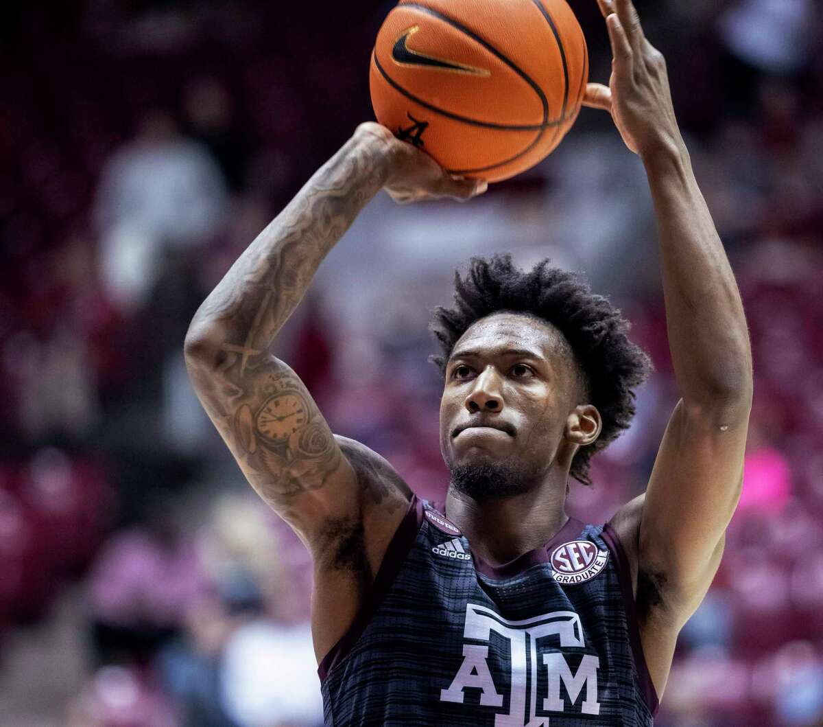 Texas A&M guard Quenton Jackson shoots a free throw against Alabama during the second half of an NCAA college basketball game Wednesday, March 2, 2022, in Tuscaloosa, Ala. (AP Photo/Vasha Hunt)