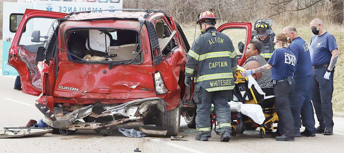 John Badman|The Telegraph Four people were hurt when a full-size Chevrolet pickup truck slammed into the rear of a GMC Yukon Wednesday afternoon on Illinois 140 in Alton about a quarter mile west of Stanley Road in Alton. The crash, which occurred about 4 p.m., sent four people to local hospitals. Additional details were not available Wednesday afternoon; Alton Police are investigating the crash.
