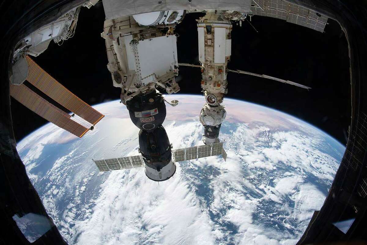 This Dec. 6, 2021 photo provided by NASA shows the International Space Station 264 miles above the Tyrrhenian Sea with the Soyuz MS-19 crew ship docked to the Rassvet module and the Prichal module, still attached to the Progress delivery craft, docked to the Nauka multipurpose module. (NASA via AP)