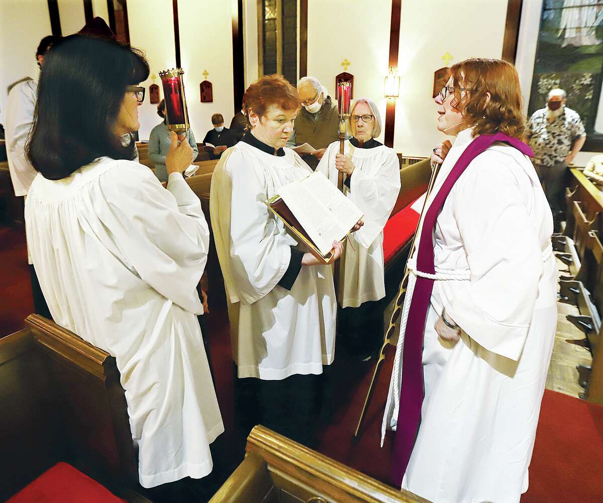 John Badman|The Telegraph About 30 parishoners returned to the sanctuary of St. Paul's Episcopal Church in Alton Wednesday night for the first service since a fire heavily damaged the church in June 2020. The Rev. Cynthia Sever compared the church to Fawkes, the phoenix belonging to Albus Dumbledore in the Harry Potter movies. 