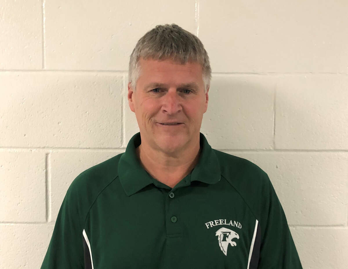 Jeff Bell was the point guard for Freeland's 1982 basketball team which went 20-0, and he now has served as the Falcons' athletics director for the past several years.