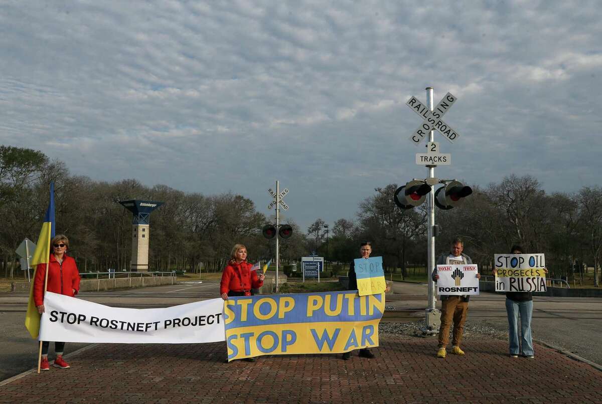 Nataliya Paschchenko, left to right, Larysa Drobot, Tatiana Makhova, Sergey Makhotkin and Paulina Miakish protest the ongoing Russian invasion of Ukraine, outside Schlumberger on Thursday, March 3, 2022, in Sugar Land. The group is looking to apply pressure on the oilfield services company to pull its money out of Russia.
