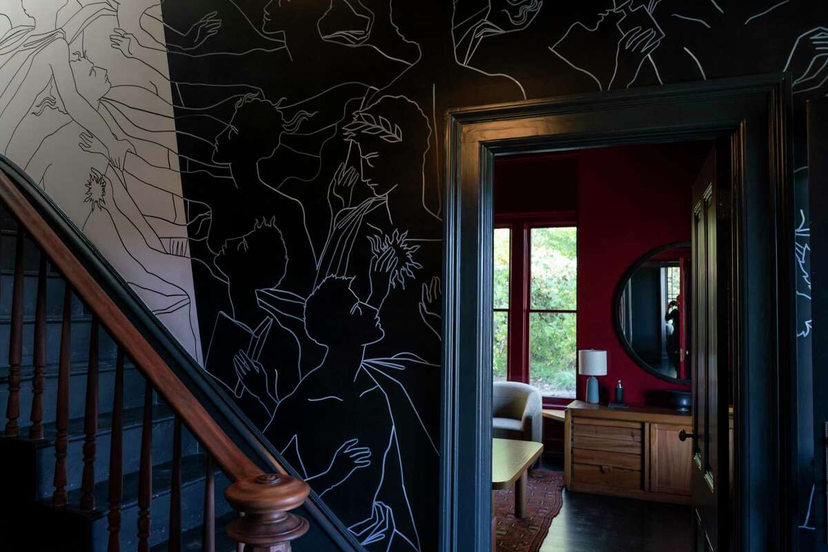 Wall art along the staircase in the newly renovated Faust Haus, a design-foward winery in St. Helena.