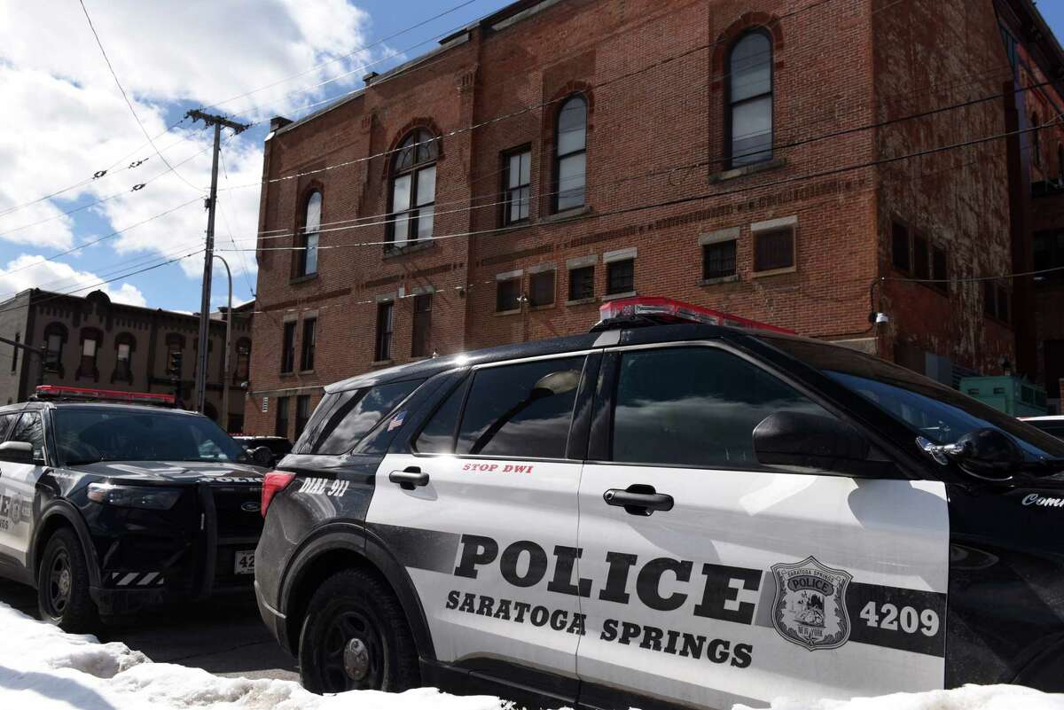 Saratoga Springs police cars are parked behind the station on Thursday, March 3, 2022, on Maple Ave. in Saratoga Springs, N.Y.