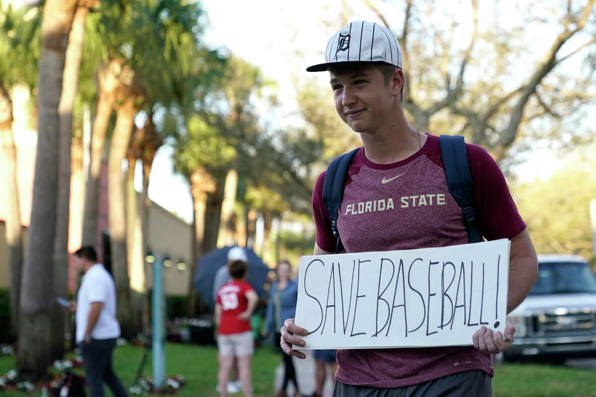 Noah McMurrain of Boynton Beach, Fla., expresses himself Monday at Roger Dean Stadium in Jupiter, Fla., site of Major League Baseball negotiations between owners and players.