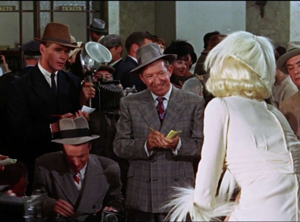 James Davidson is seen in the top left in an uncredited role in the 1965 movie "Harlow."