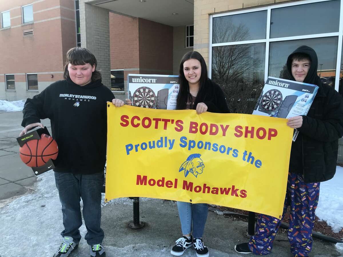 Model Mohawks include (left to right): Michael Groot, sixth grade; Jordas Sturdavant, seventh grade; and Antonio Hammond, eighth grade.     