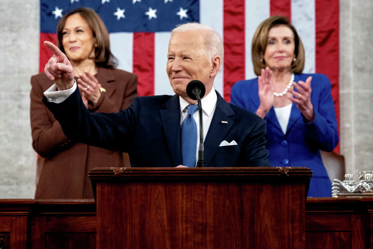 U.S. President Joe Biden delivers the State of the Union address as U.S. Vice President Kamala Harris (L) and House Speaker Nancy Pelosi (D-CA) look on. (Photo by Saul Loeb - Pool/Getty Images)