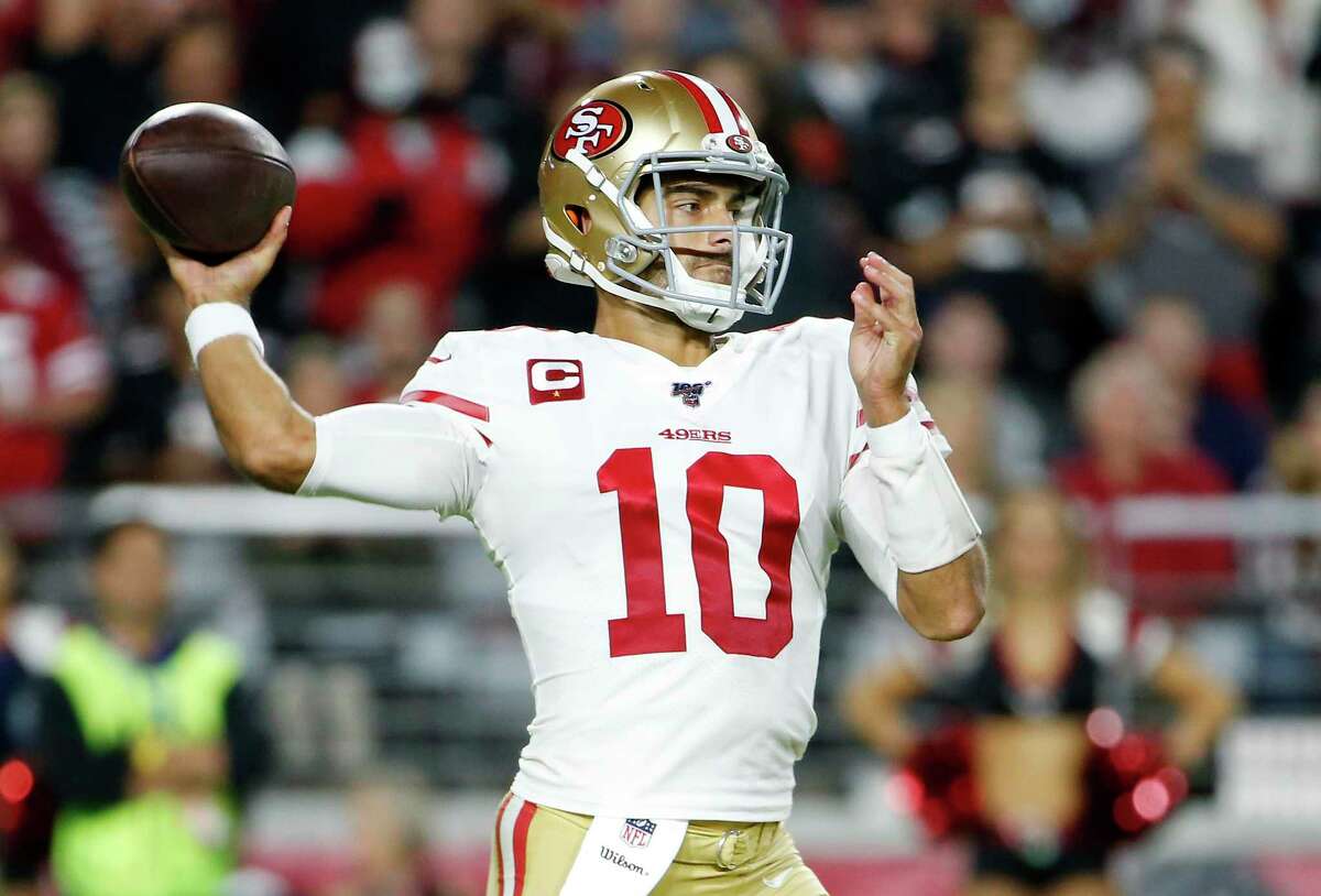 GLENDALE, ARIZONA - OCTOBER 31: Quarterback Jimmy Garoppolo #10 of the San Francisco 49ers throws a pass against the Arizona Cardinals during the first half of the NFL football game at State Farm Stadium on October 31, 2019 in Glendale, Arizona. (Photo by Ralph Freso/Getty Images)