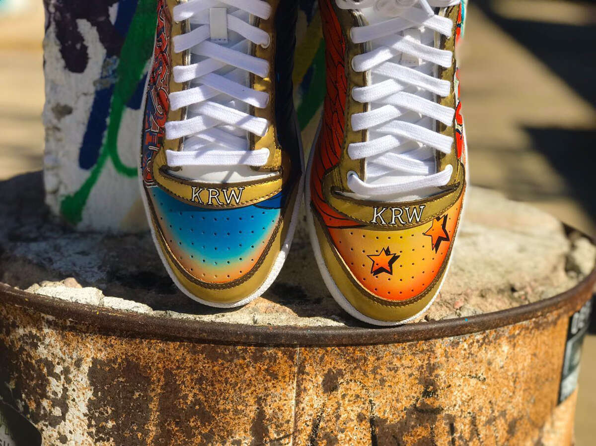 Local artist Dimas Martinez has created two pairs of shoes that scream San Antonio in support of the autism treatment center.  