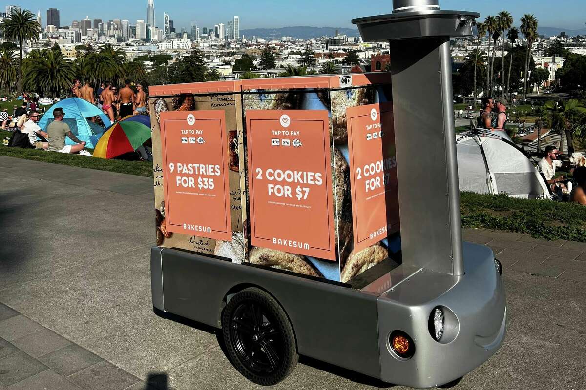 A Tortoise "Mobile Smart Store" prowls around Dolores Park.