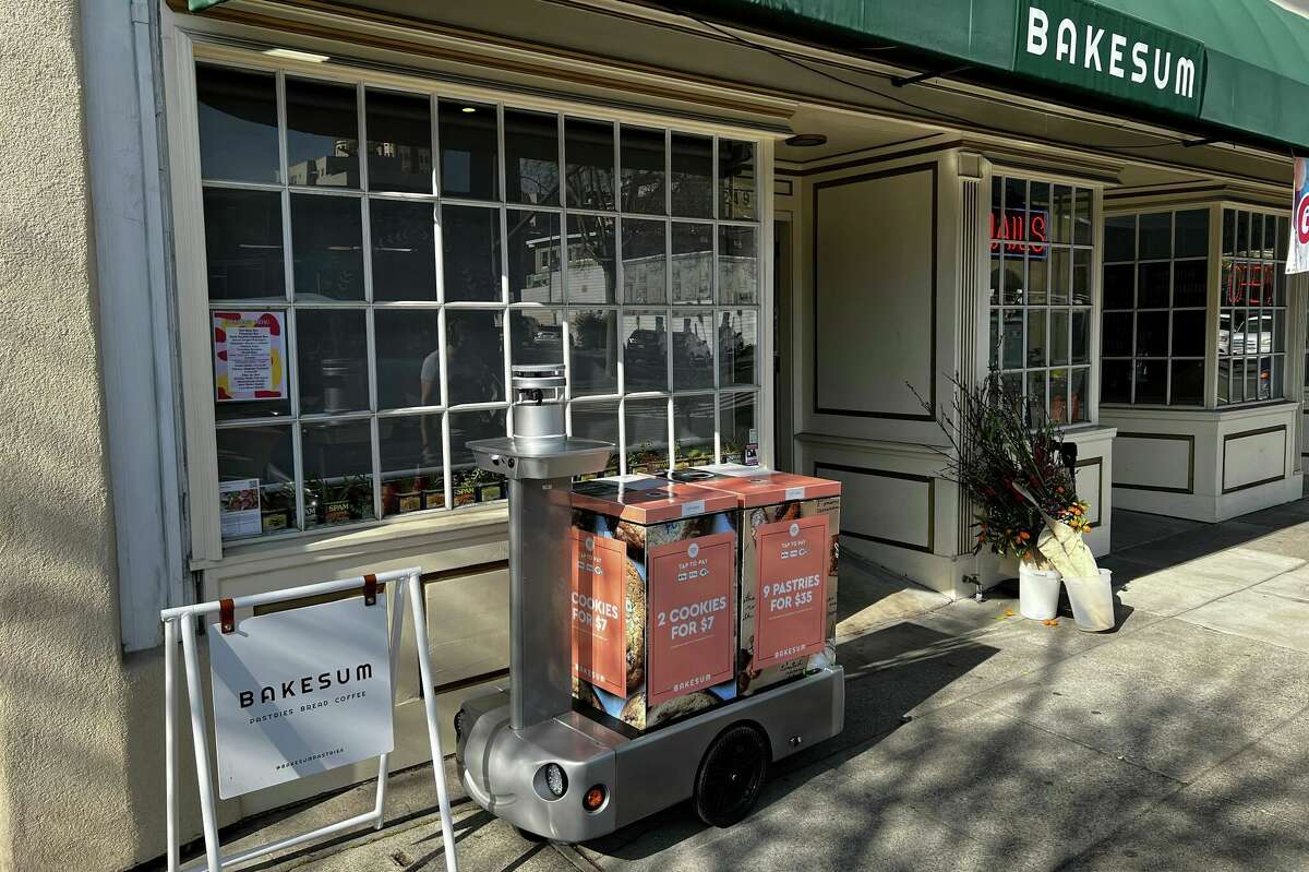 A Tortoise robot stationed in front of Bake Sum, a bakery located at 3249 Grand Ave., Oakland.