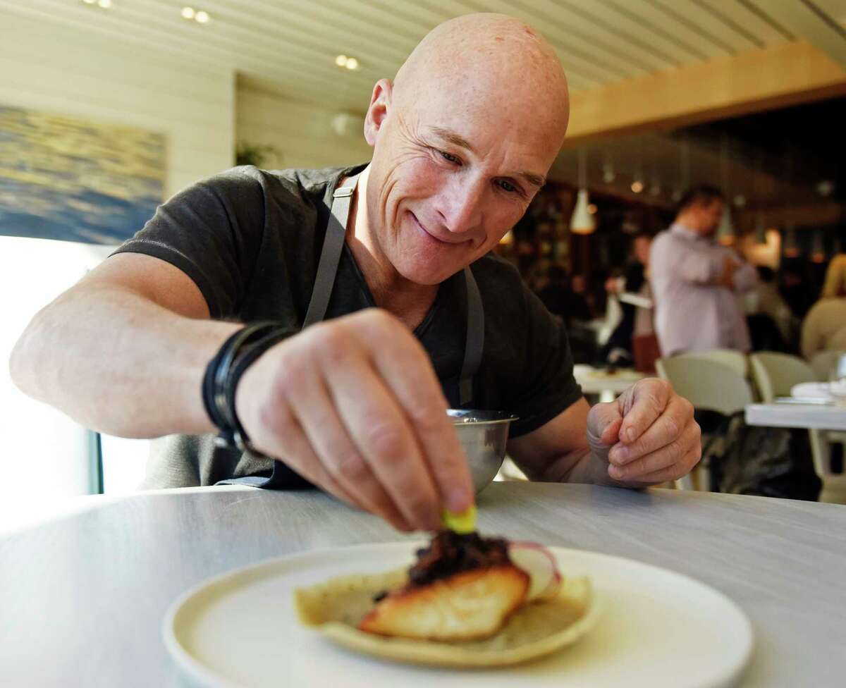 Chef Brian Lewis prepares a miso black cod crepe at The Cottage in Greenwich, Conn. Thursday, March 3, 2022. Chef Brian Lewis' restaurant The Cottage is opening a new location at 49 Greenwich Ave., joining its original in Westport.