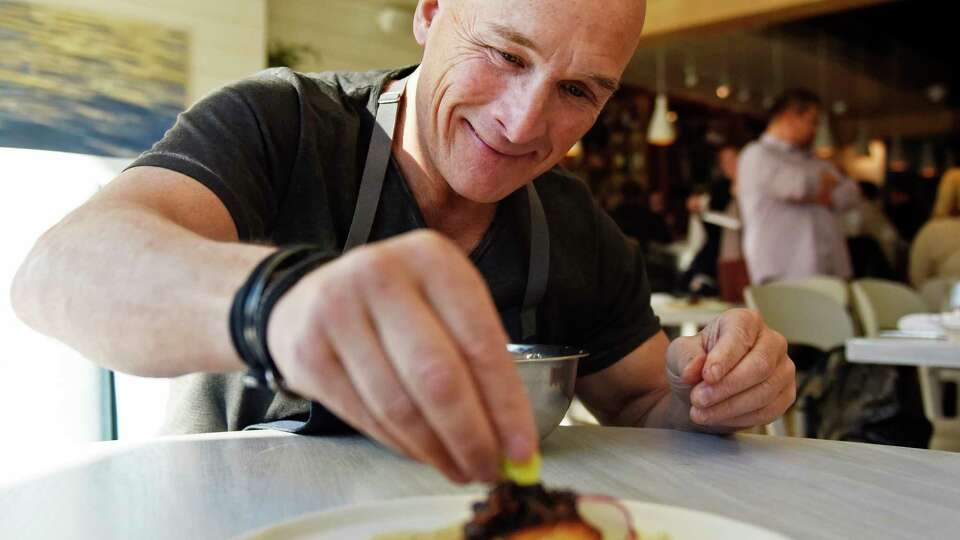 Chef Brian Lewis prepares a miso black cod crepe at The Cottage in Greenwich, Conn. Thursday, March 3, 2022. Chef Brian Lewis' restaurant The Cottage is opening a new location in at 49 Greenwich Ave., joining its original in Westport.