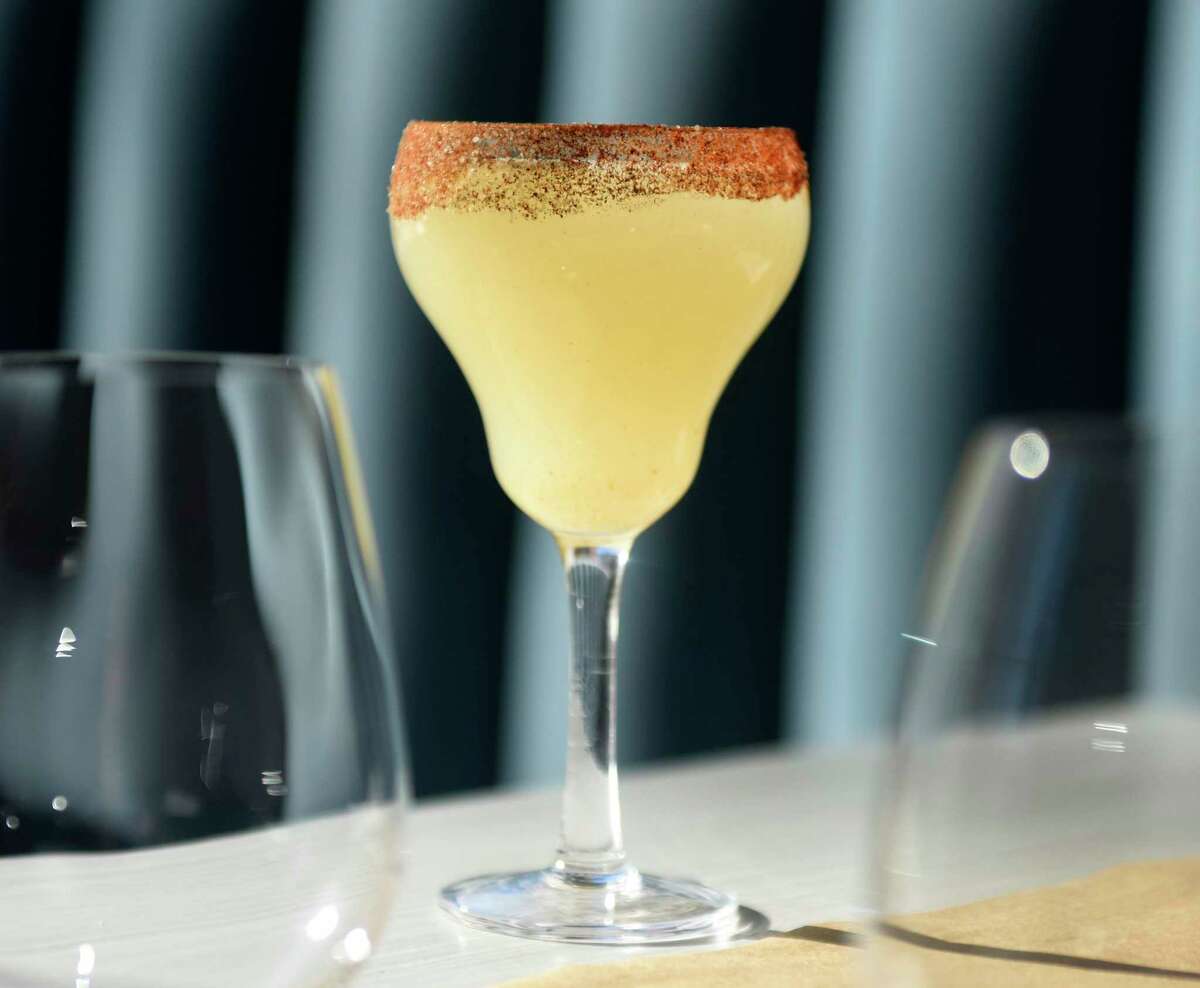 The spicy pear drink, featuring pear vodka, pear puree, cayenne, and cinnamon, at The Cottage in Greenwich, Conn. Thursday, March 3, 2022. Chef Brian Lewis' restaurant The Cottage is opening a new location at 49 Greenwich Ave., joining its original in Westport.