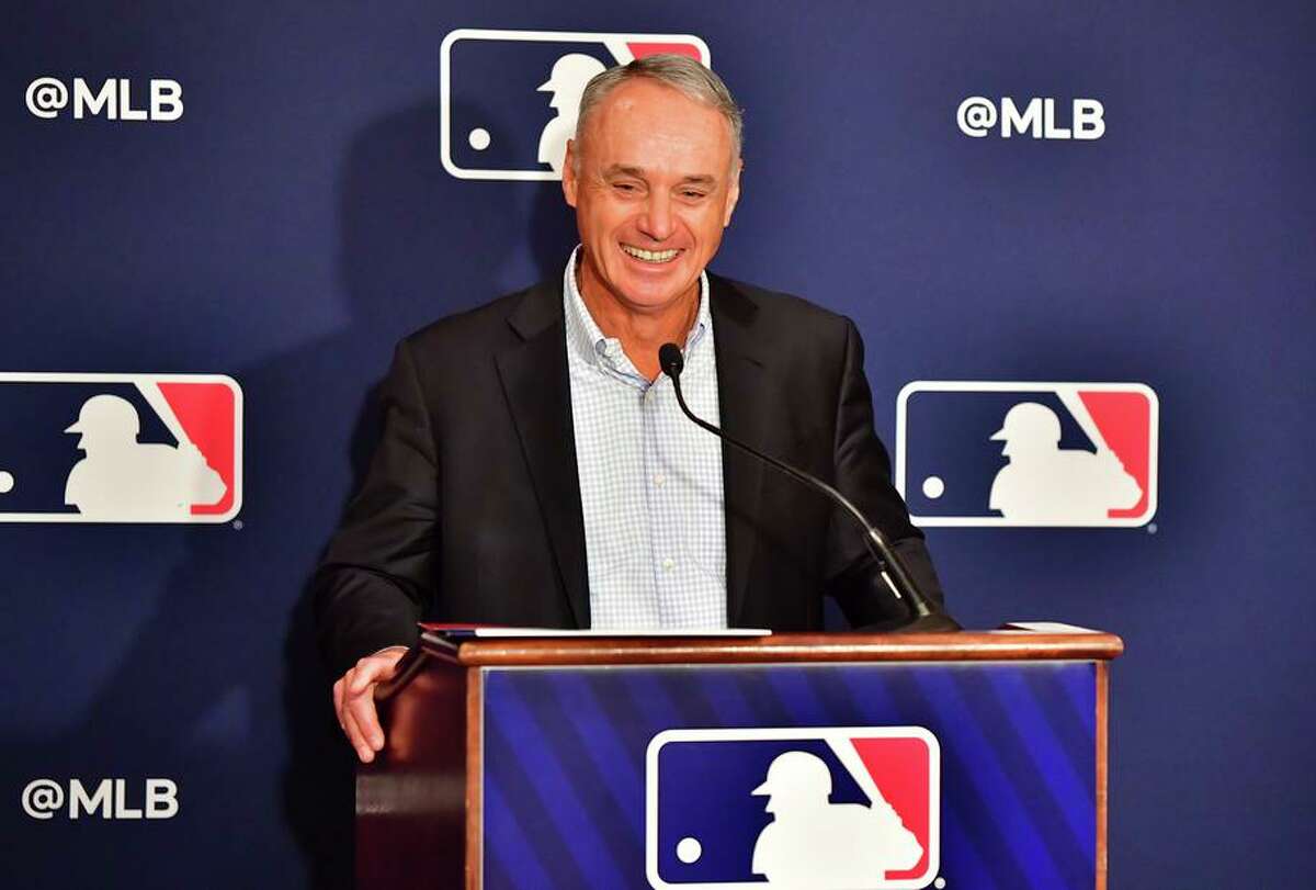In this photo from Feb. 10, 2022, Major League Baseball Commissioner Rob Manfred answers questions during an MLB owner's meeting at the Waldorf Astoria in Orlando, Florida. (Julio Aguilar/Getty Images/TNS)