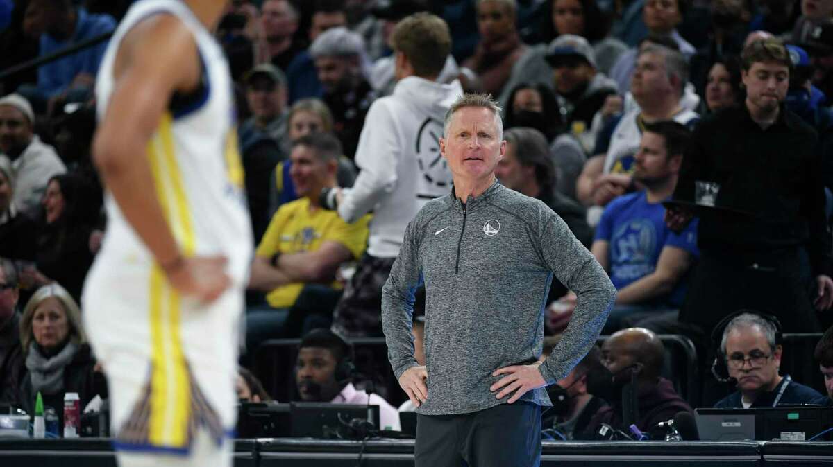 Golden State Warriors head coach Steve Kerr in action against the Minnesota Timberwolves during the second half of an NBA basketball game Tuesday, March 1, 2022, in Minneapolis. The Timberwolves won 129-114. (AP Photo/Craig Lassig)
