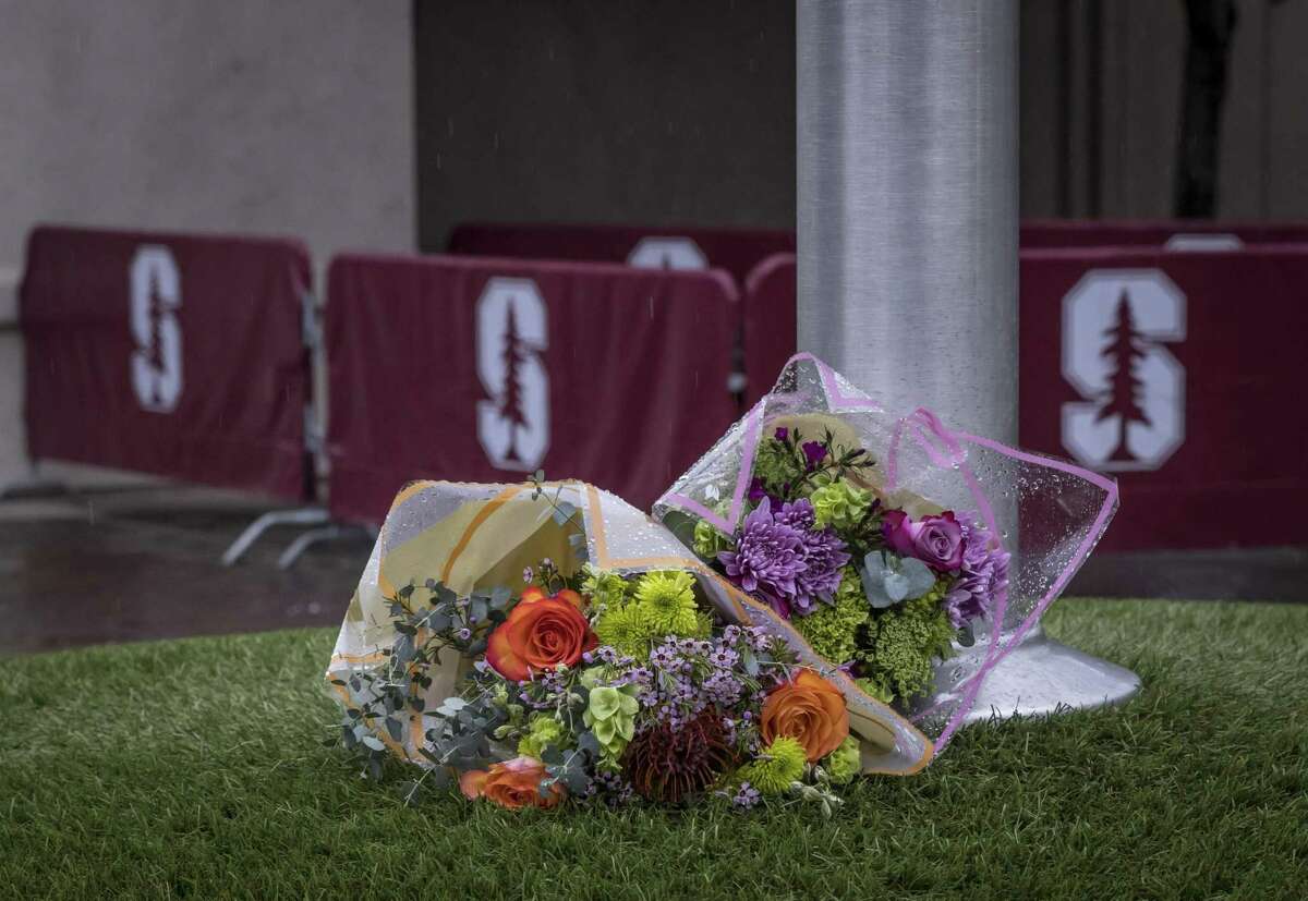 A bouquet of flowers outside Maloney Field at Laird Q. Cagan Stadium honors Katie Meyer, a student and standout soccer player for the university who died Wednesday.