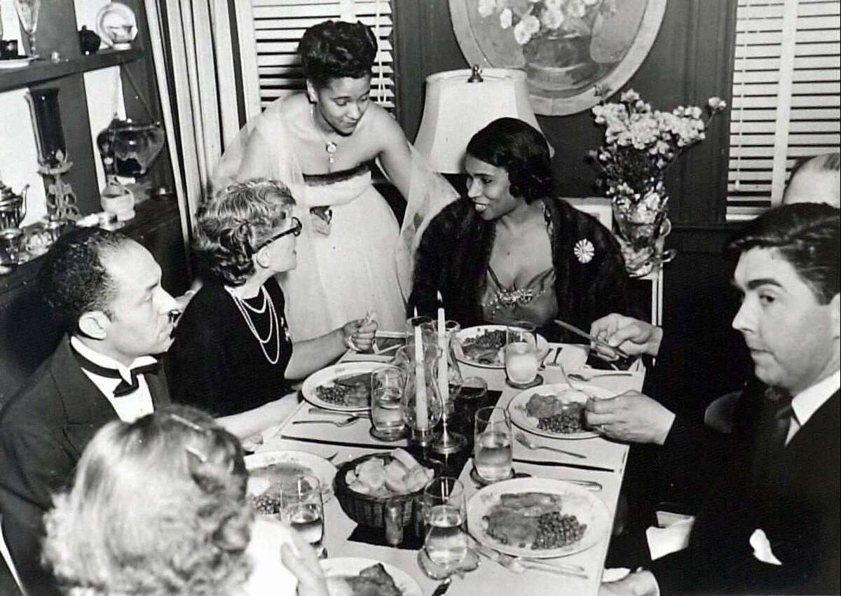 A dinner scene at Alver Napper's house around 1945.