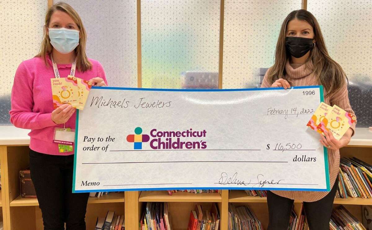 Photographed presenting the donations on Valentine’s Day in Hartford was DeAnna Syner, Michaels Jewelers Director of Marketing, right, pictured with Alyssa Horrall of CT Children’s Medical Center.