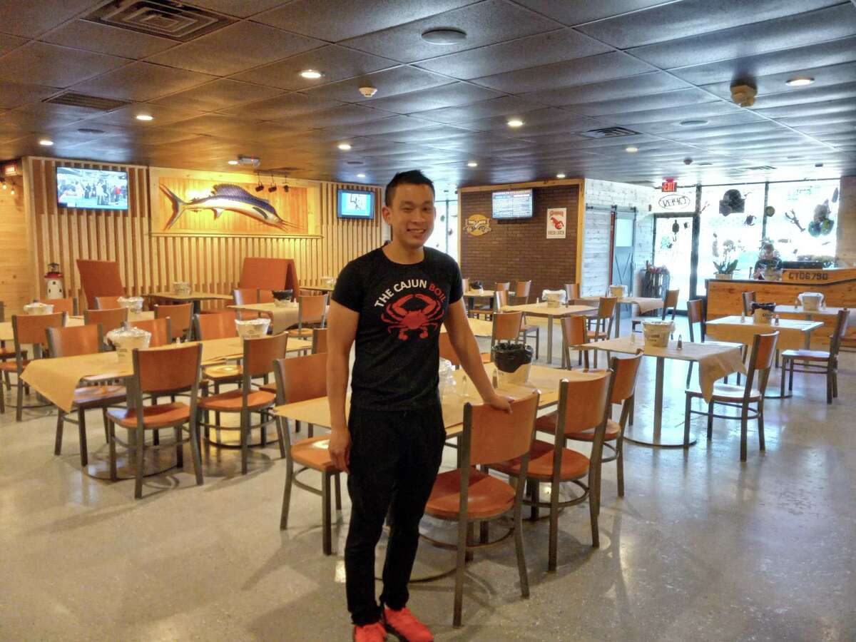 The Cajun Boil seafood restaurant opened Feb. 25 on Winsted Road in Torrington. Owner Linh Duong stands in the dining room.