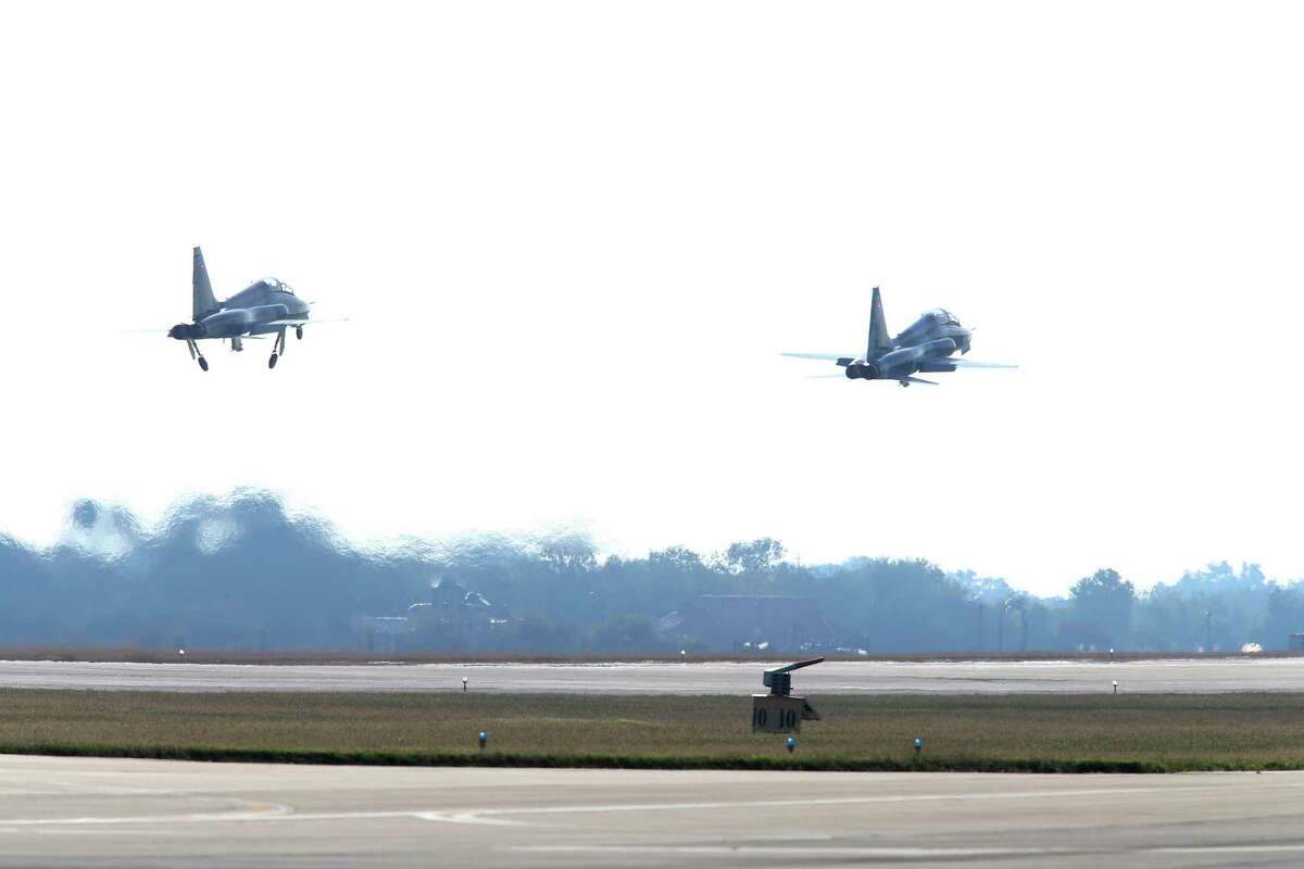 A pair of T-38 Talons take off at Joint Base San Antonio-Randolph in the fall of 2021. Part of the training fleet was grounded Wednesday at bases across the country to check a possible defect in the plane’s escape system.