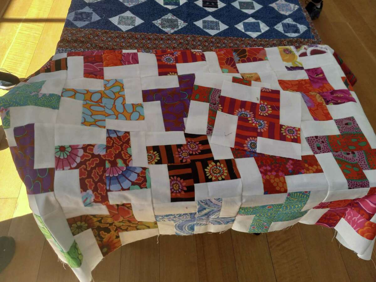 Quilts that Care providing handmade comfort for cancer patients