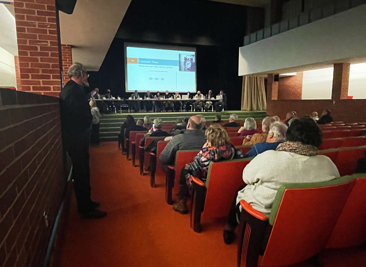Concerned residents attend a public hearing and meeting of the Four Lakes Task Force Thursday, March 3, 2022 in the Grace A. Dow Library auditorium.