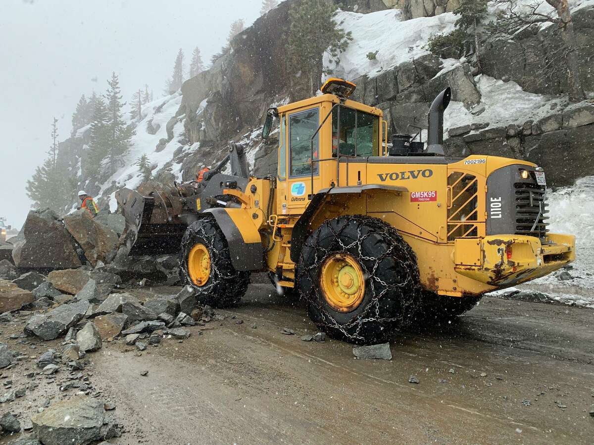 Caltrans crews removing the debris left over after from a massive boulder blocking Highway 50 in El Dorado County was blasted apart by explosives.