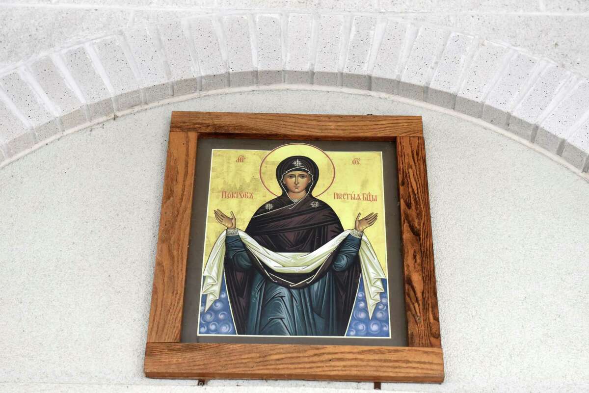 An icon of the Holy Virgin Mary hangs above the entrance to the Nativity of the Most Holy Mother of God, Russian Orthodox Church Outside of Russia on Friday, March 4, 2022, on Sand Creek Road in Colonie, N.Y.