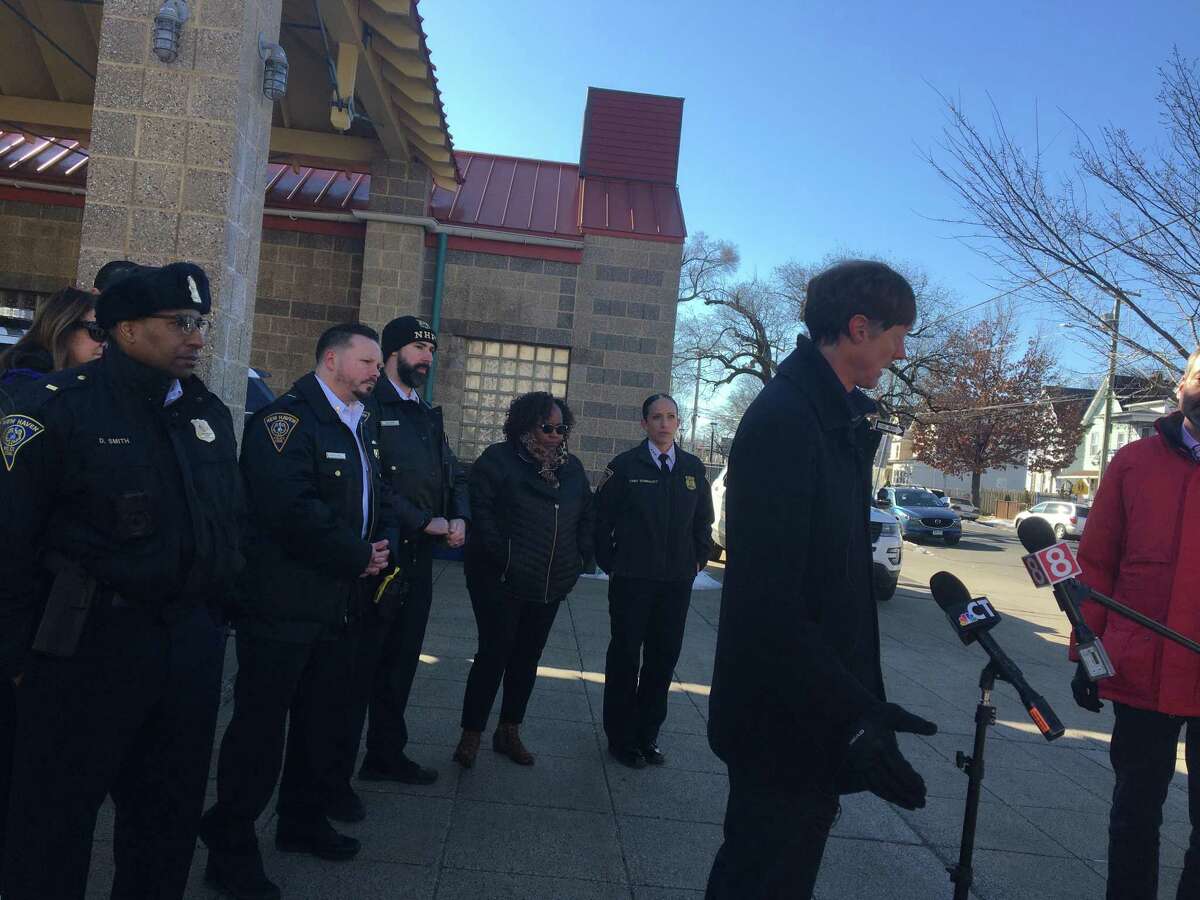 New Haven Mayor Justin Elicker speaks at a press conference in front of the Fair Haven Police Substation on Blatchley Avenue prior to a Corner Store Sweep in the Fair Haven neighborhood Friday focusing on quality-of-life issues.