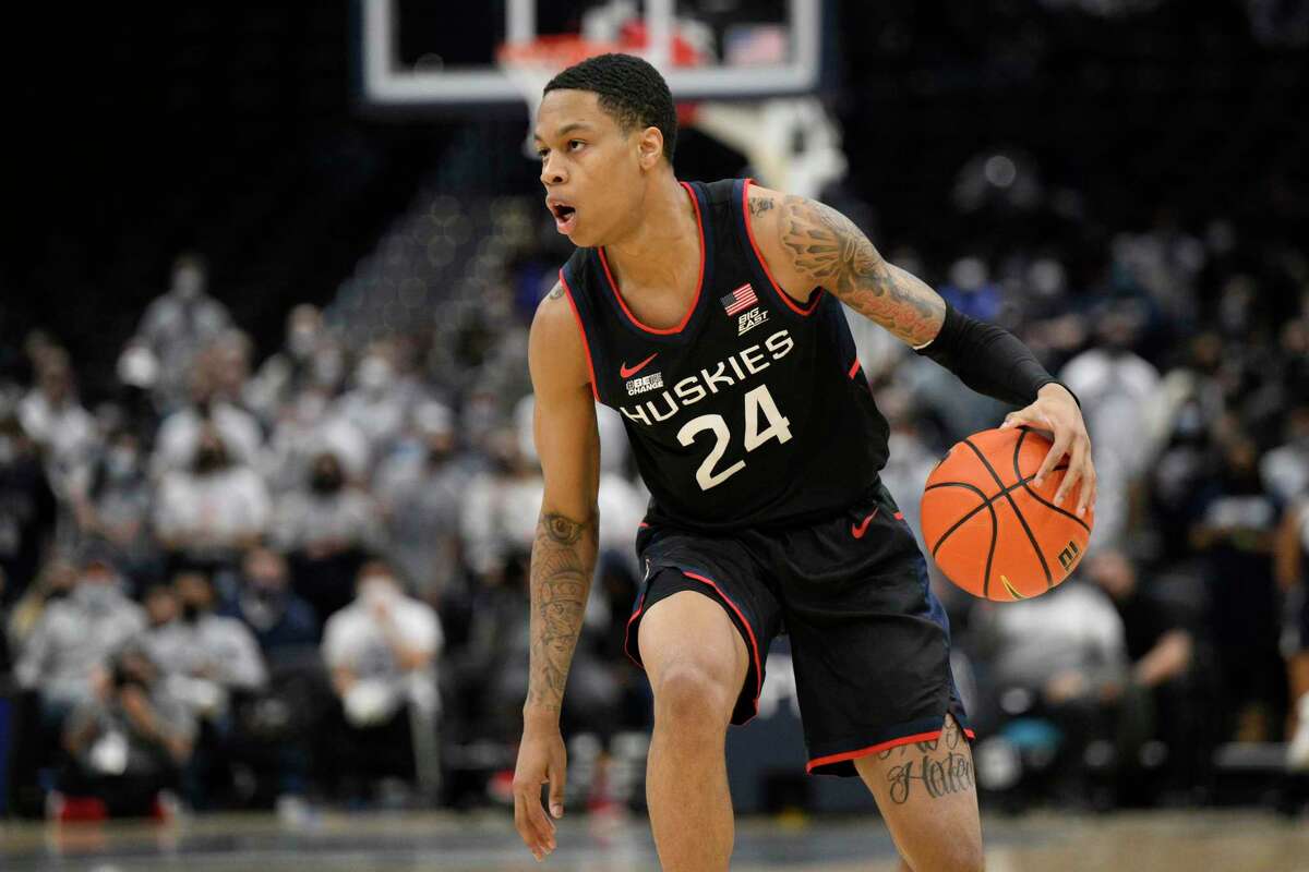 UConn freshman guard Jordan Hawkins, a key contributor off the bench, will miss Saturday’s game against DePaul while in concussion protocol.