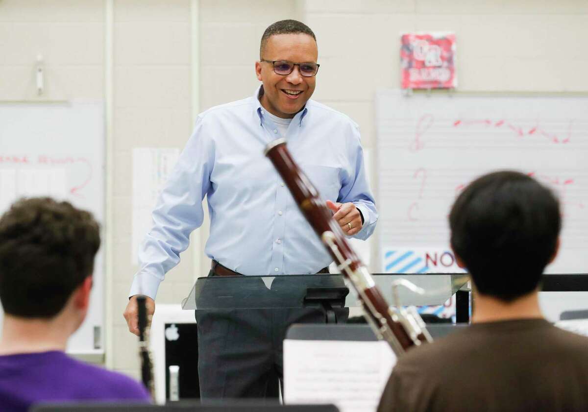 Oak Ridge High School band director Jerriald Dillard laughs with students as they warm up, Thursday, March 3, 2022. was awarded the 2021 UIL Sponsor Excellence Award. The Sponsor Excellence Award was created to identify and recognize outstanding sponsors who assist students in developing and refining their extracurricular talents to the highest degree possible within the educational system while helping them to keep their personal worth separate from their success or failure in competition.