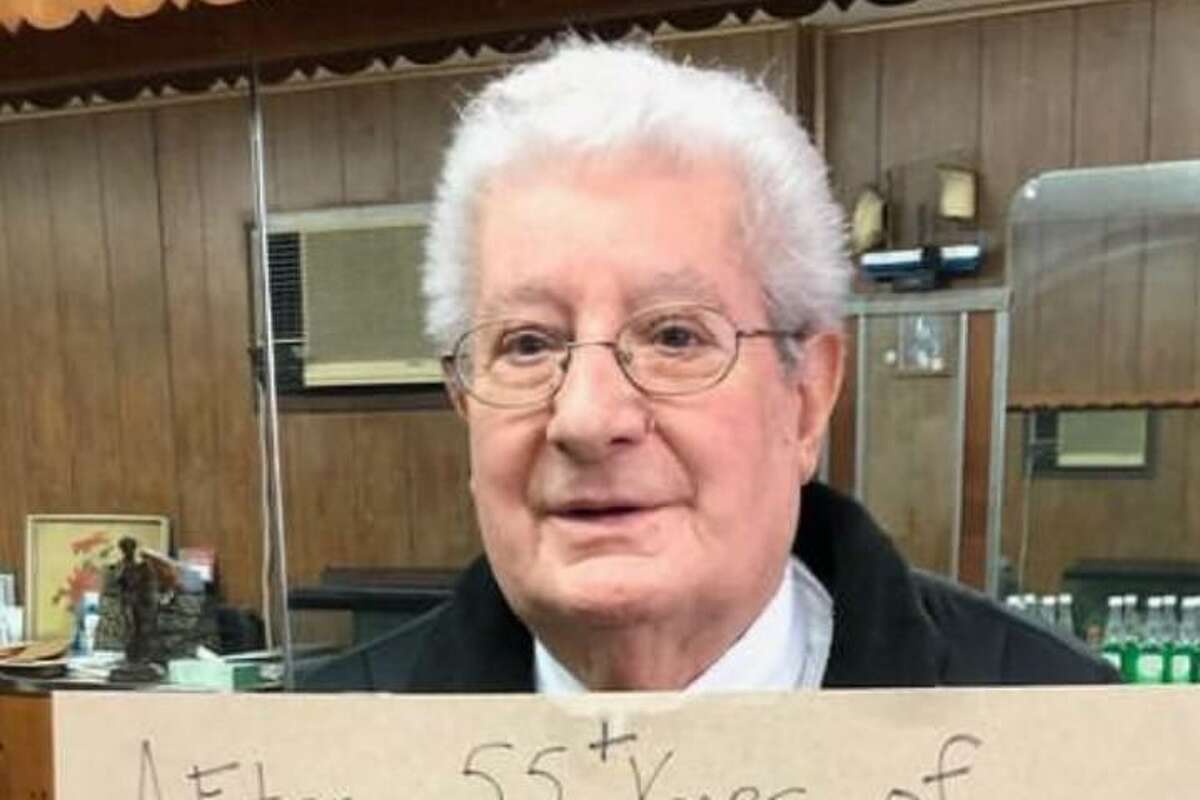Gaetano “Guy” Camagna at his Hollywood Barber Shop on East Main Street in Bridgeport, which he ran for more than 50 years before retiring last month.