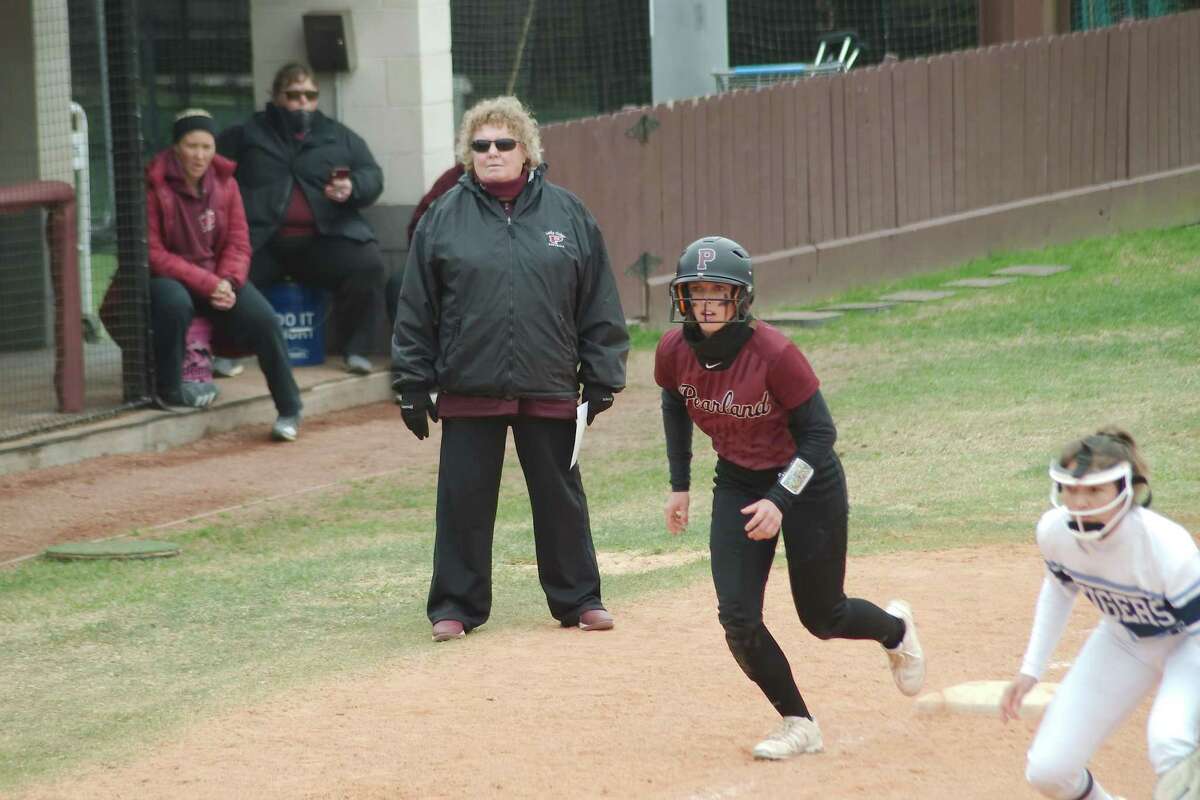 Pearland softball coach Laneigh Clark watches as Hailey Golden leads off third base in action earlier this year against Corpus Christi Carroll. The Lady Oilers defeated Humble Summer Creek Saturday to advance to play Clear Springs in the regional quarterfinals.