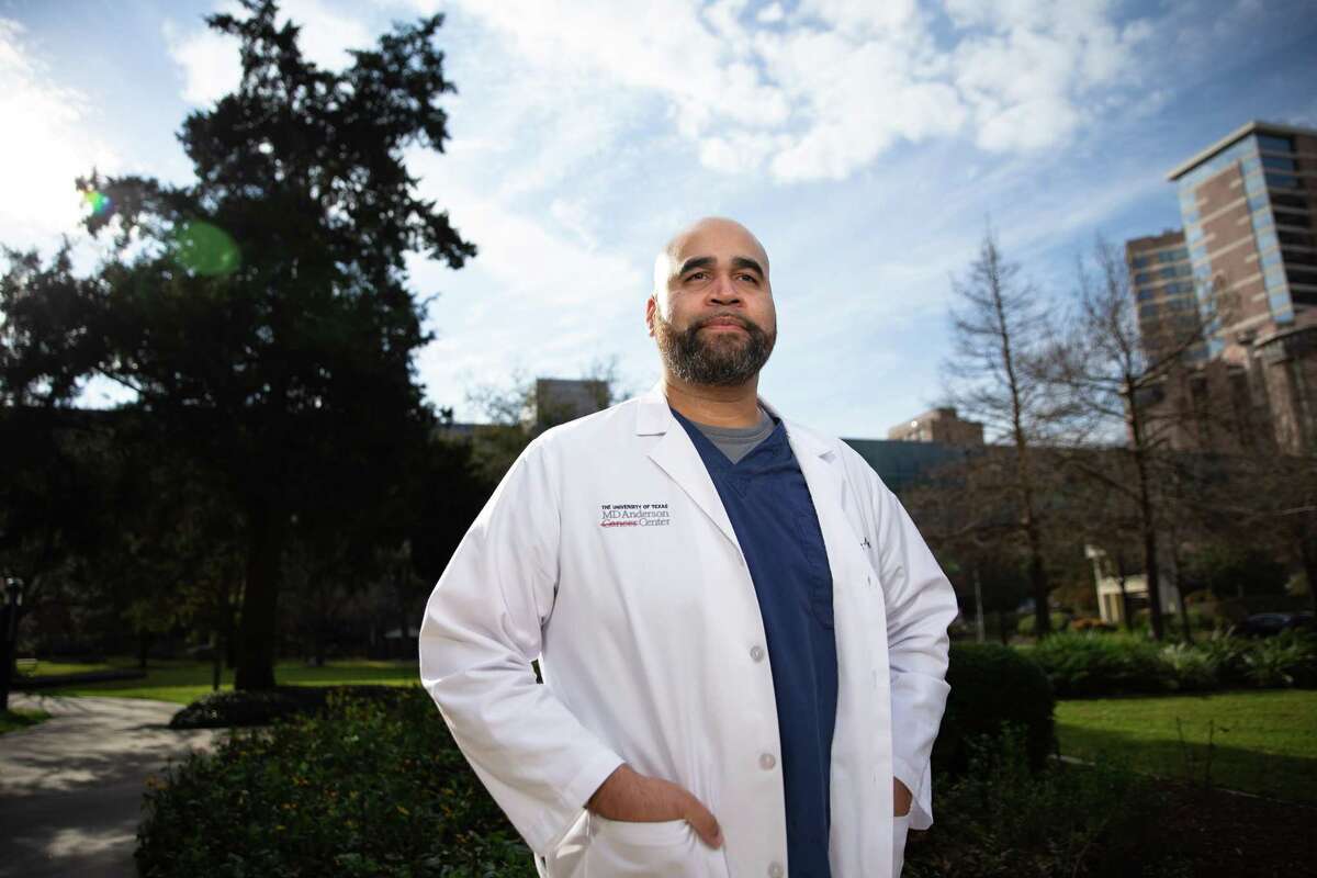 Dr. Jason Willis, assistant professor of Gastrointestinal Medical Oncology at University of Texas MD Anderson Cancer Center, poses for a portrait Thursday, March 3, 2022, at Texas Medical Center in Houston. Willis is leading research that he hopes will illuminate the genetic risk factors that contribute to higher rates of colon cancer among the Black and Hispanic populations. He hopes to publish the work within the next six months.