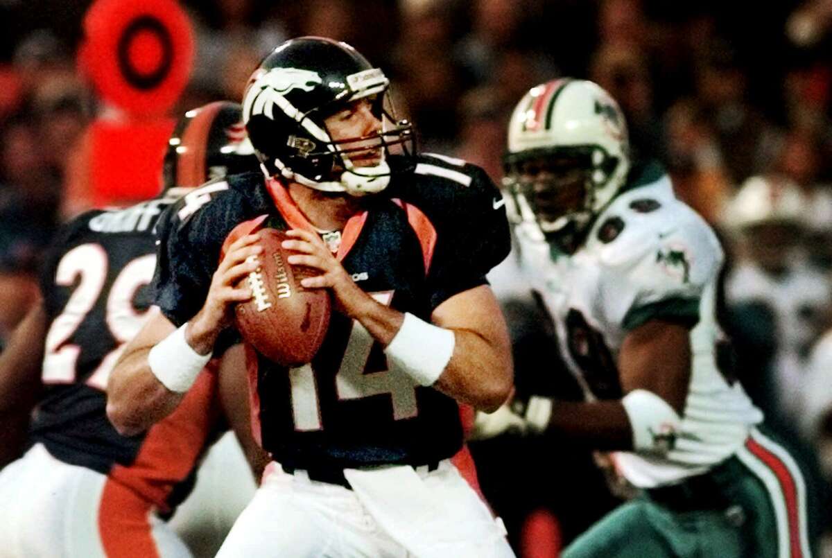 ADVANCE FOR WEEKEND EDITIONS OCT 2-3--FILE--Denver Broncos starting quarterback Brian Griese looks for an opening to pass during the first quarter of the game against the Miami Dolphins in Denver, Sept. 13, 1999. The Broncos will face the New York Jets Sunday, Oct. 3, 1999 at Mile High Stadium in a rematch of last season's AFC championship game. (AP Photo/Pueblo Chiedtain, Brian Kelsen)