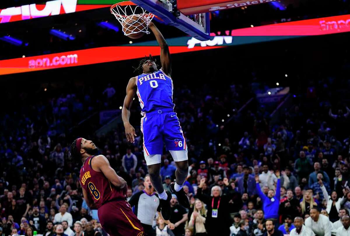 Tyrese Maxey of the 76ers dunks over the Cavaliers’ Lamar Stevens during a second half in which he lit up Cleveland.