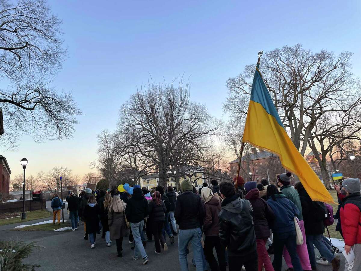 Dozens of Wesleyan University students, faculty, staff and community members rallied Friday on the Middletown campus in support of Ukraine amid the Russian invasion.