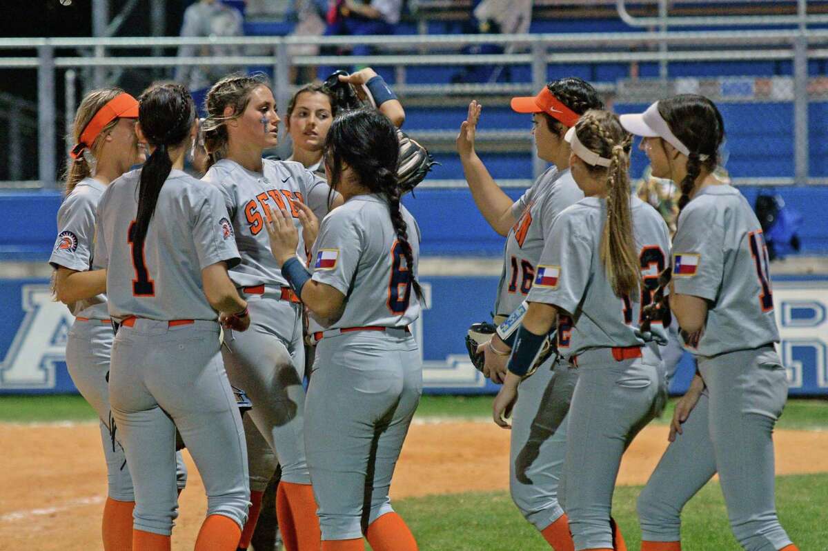 The Seven Lakes Spartans celebrate their victory over the Taylor Mustangs after a 6A Region III District 19 softball game on Friday, March 4, 2022 at Taylor HS, Katy, TX.