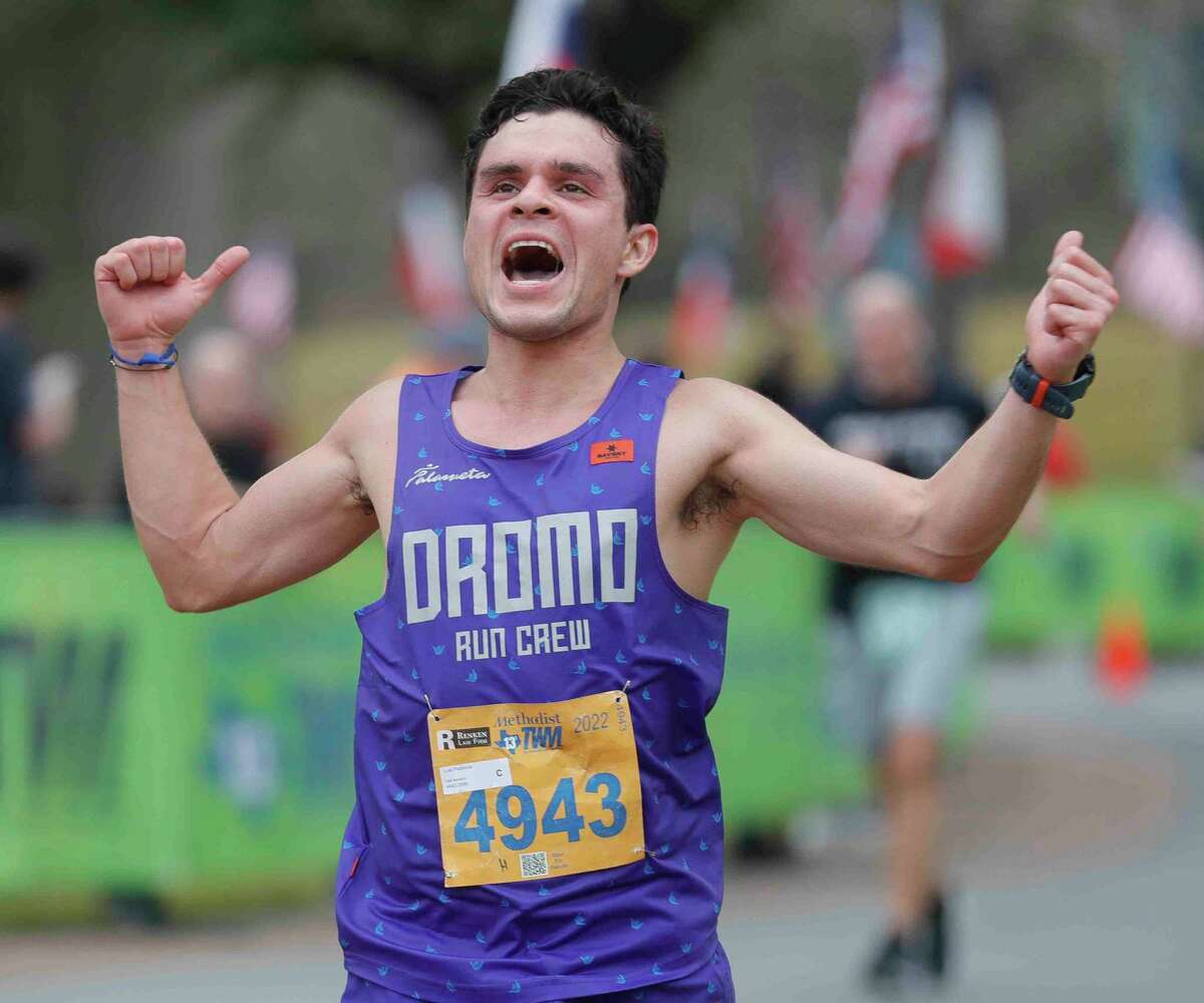 Luis Plasencia reacts after taking part in The Woodlands Marathon, Saturday, March 5, 2022, in The Woodlands.