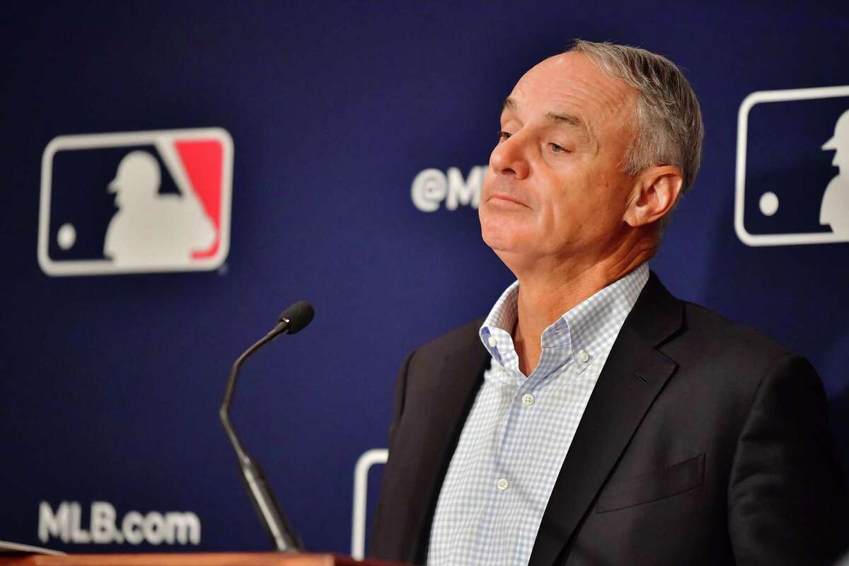 In this photo from February 10, 2022, Major League Baseball Commissioner Rob Manfred answers questions during an MLB owner's meeting at the Waldorf Astoria in Orlando, Florida. Manfred addressed the ongoing lockout of players, which owners put in place after the league's collective bargaining agreement ended on December 1, 2021. (Julio Aguilar/Getty Images/TNS)
