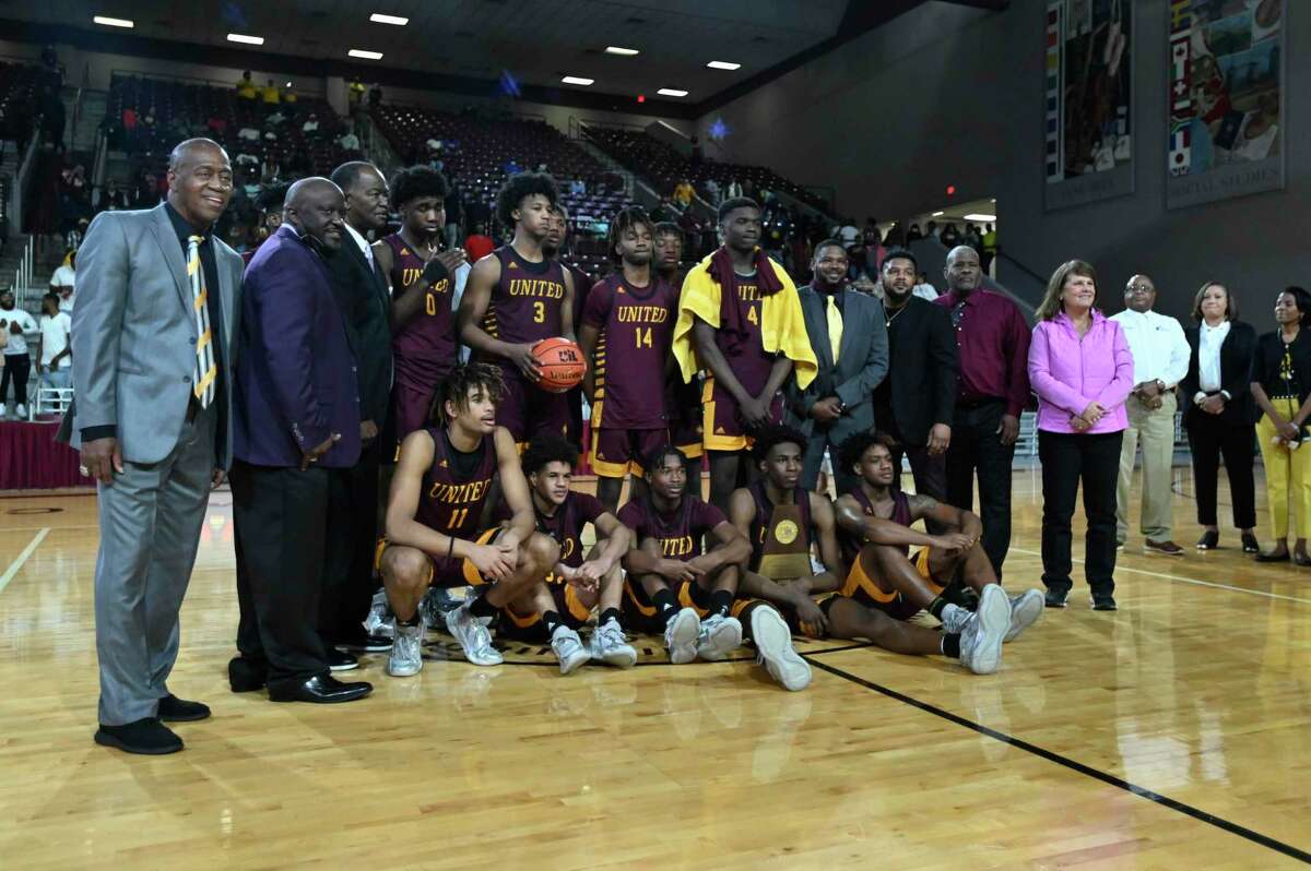 Beaumont United with the Region III-5A championship trophy after winning the championship game against Crosby in the M.O. Campbell Education Center Saturday, March 5, 2022, in Houston, Texas.