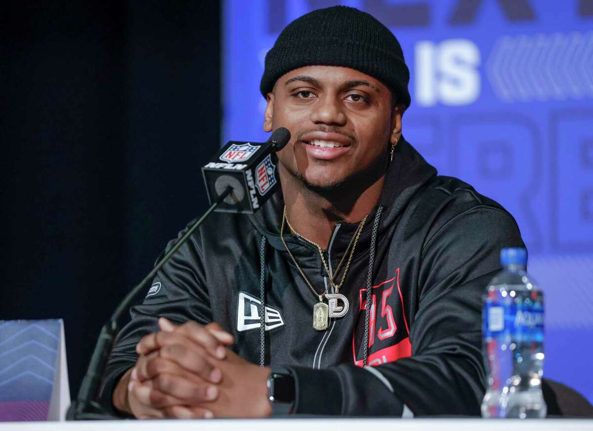 INDIANAPOLIS, IN - MARCH 04: Demarvin Leal #DL15 of the Texas A&M Aggies speaks to reporters during the NFL Draft Combine at the Indiana Convention Center on March 4, 2022 in Indianapolis, Indiana. (Photo by Michael Hickey/Getty Images)