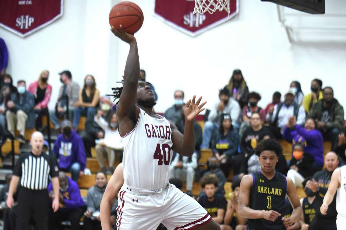 Sacred Heart Prep’s R.J. Stephens goes to the basket against Oakland Tech on Thursday, March 3.