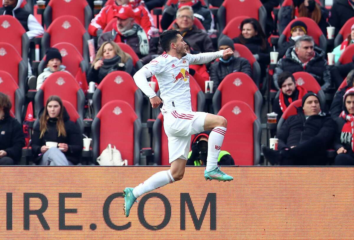 TORONTO, ON - MARCH 05: Lewis Morgan #10 of New York Red Bulls celebrates his third goal during the first half of an MLS game against Toronto FC at BMO Field on March 05, 2022 in Toronto, Ontario, Canada. (Photo by Vaughn Ridley/Getty Images)