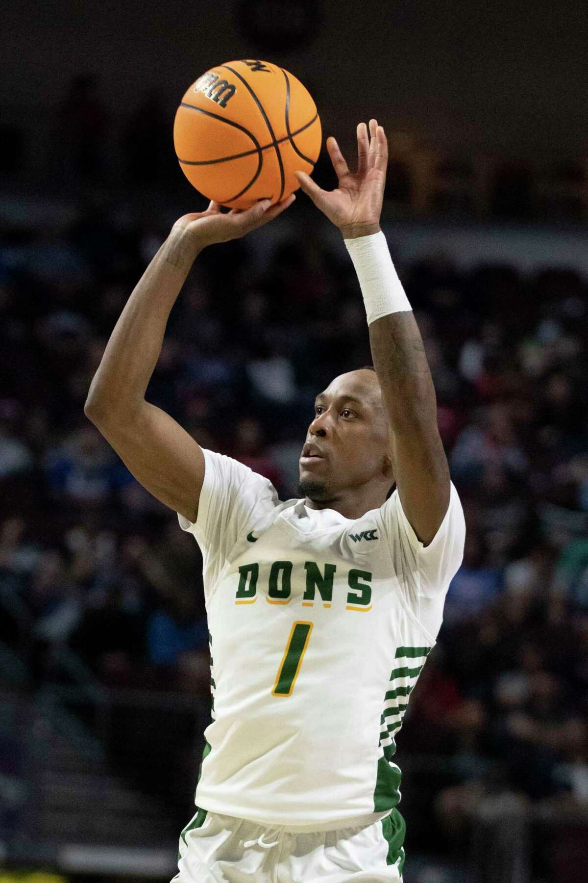 USF's Jamaree Bouyea takes a jumper against BYU in a WCC quarterfinal in Las Vegas on Saturday night.