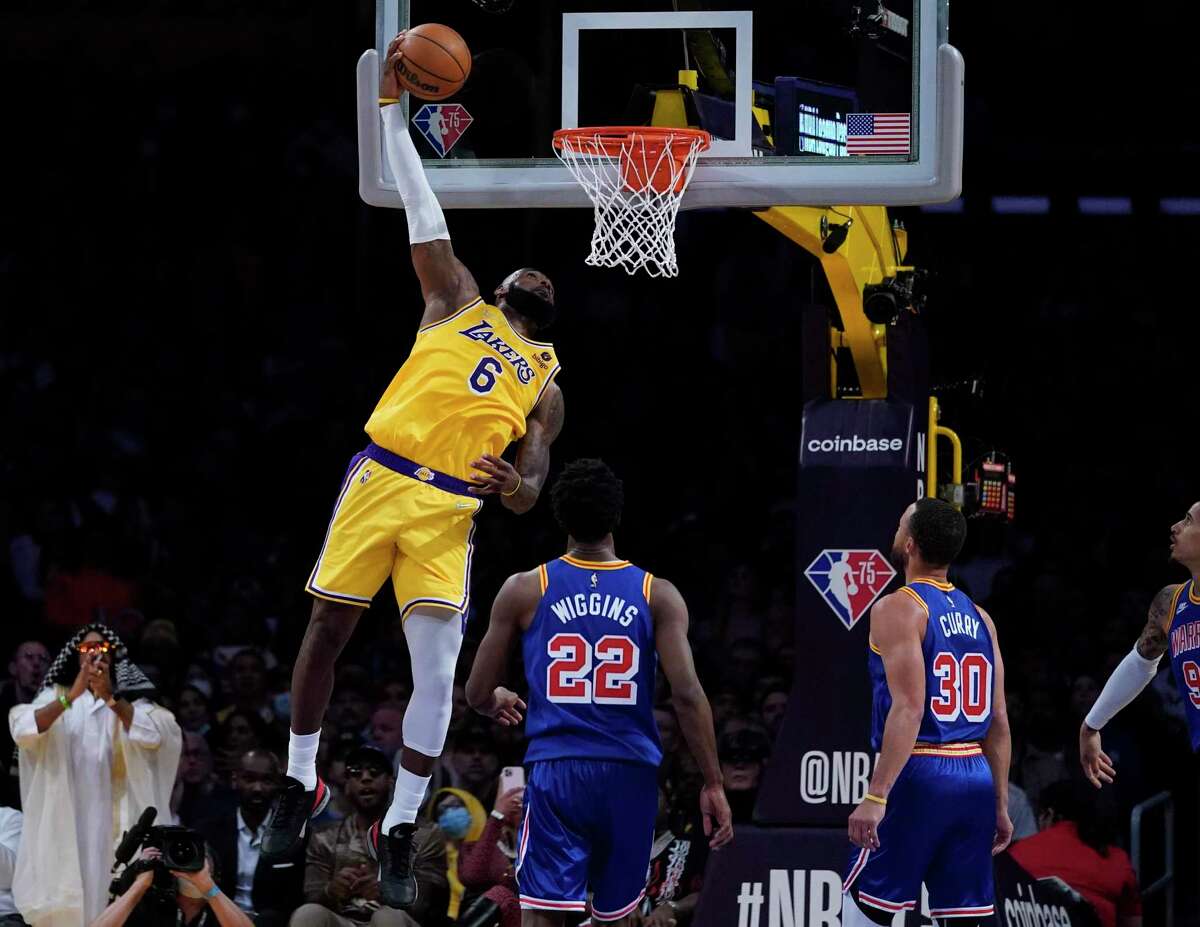 Los Angeles Lakers forward LeBron James (6) shoots during the second half of an NBA basketball game against the Golden State Warriors in Los Angeles, Saturday, March 5, 2022. (AP Photo/Ashley Landis)