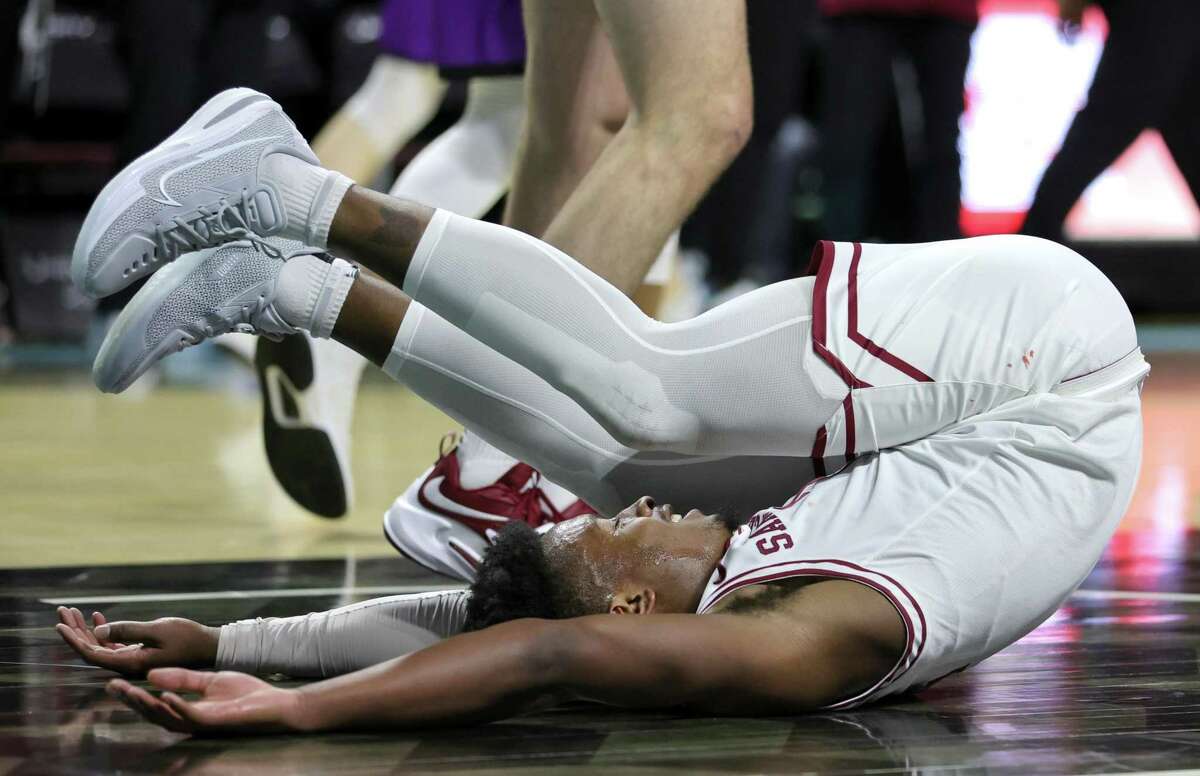 LAS VEGAS, NEVADA - MARCH 05: PJ Pipes #2 of the Santa Clara Broncos ends up on the floor after taking an offensive charge from the Portland Pilots during the West Coast Conference basketball tournament quarterfinals at the Orleans Arena on March 05, 2022 in Las Vegas, Nevada. (Photo by Ethan Miller/Getty Images)